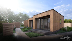 Image of a modular home, showing the front section with a step and a small patch of lawn.